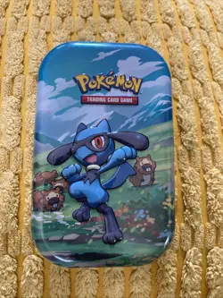 Pokemon Trading Card Game Riolu Tin ONLY - Image 1