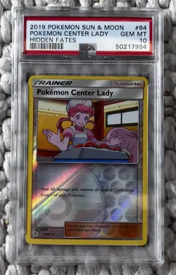 Hidden Fates Pokemon Center Lady 64/68 Gem Mint PSA 10 (POP 7) - Image 1