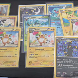 Nintendo Pokemon TCG Mixed Card Lot Raichu Umbreon Leafeon - Image 1