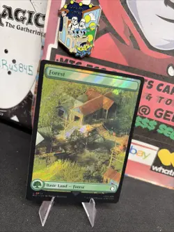 Forest (0854) (Surge Foil) Universes Beyond: Fallout Foil LP MAGIC THE GATHERING - Image 1
