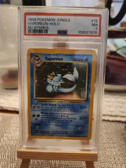 Vaporeon No Symbol Error Jungle Holo 12/64 Pokemon Card Misprint PSA 7 NM - Image 1