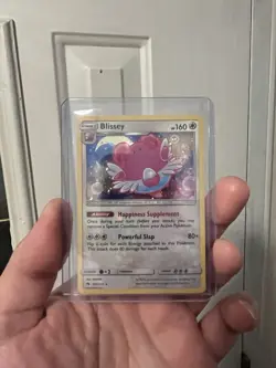 Blissey (Cosmos Holo) 153/214 SM - Lost Thunder Rare Pokemon Card - Image 1