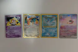 Pokemon Card Lot; Charizard EX, Charizard D. Species, Articuno 1st, Jirachi ex - Image 1