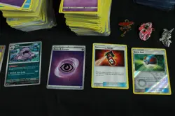 Pokemon Card Lot - Trainers, Energy and Pokemon with pins and storage box. - Image 3