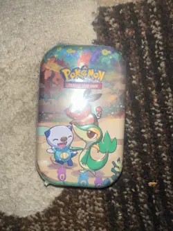 Pokemon TCG Celebrations Unova Mini Tin Pack Sealed Snivy Tepig Oshawott - Image 1