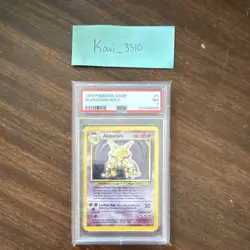 Pokemon TCG Alakazam Holo Rare Base Set PSA 7 1/102 1999 English - Image 1