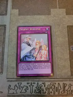 YUGIOH SOLEMN WARNING PGL2-EN068 GOLD 1ST ED NM - Image 1