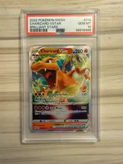 2022 POKEMON SWORD & SHIELD BRILLIANT STARS #018 CHARIZARD VSTAR PSA 10 - Image 1