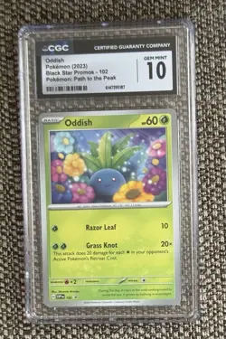 Pokemon Oddish 2023 Black Star Promos 102 Pokemon: Path to the Peak CGC 10 - Image 1