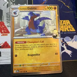 Pokemon SV10 Destined Rivals - Cynthia's Gabite - 103/182 - Cosmos Holo Promo - Image 1