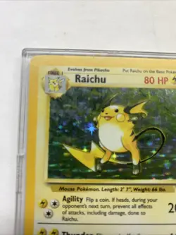 1999 Pokemon TCG Raichu Base Set Holo 14/102 Collectible Vintage - Image 2