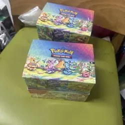 Pokemon TCG Prismatic Evolutions Mini Tin Display Case | 8 Tins / Factory Sealed - Image 1