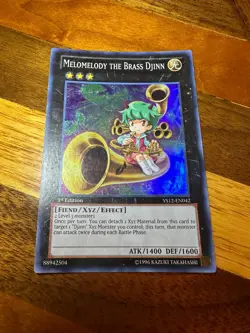 Melomelody the Brass Djinn YS12-EN042 1st Edition Super Rare PL + BONUS - Image 1