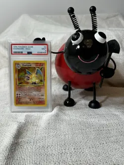 1999 POKEMON BASE SET UNLIMITED #4 CHARIZARD-HOLO PSA 9 - Image 1