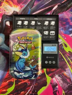 (VERY HEAVY)🔥 102.40g Pokemon Prismatic Evolutions Mini Tin Brand New Sealed - Image 1