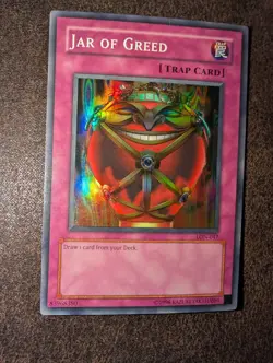 Konami Yu-Gi-Oh! Jar of Greed LON-047 Super Rare Holo Unlimited - Image 1