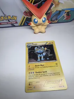 Pokemon TCG Luxio Black White BW34 Promo Cosmo Holo Swirl - Image 1