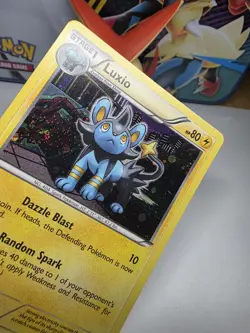 Pokemon TCG Luxio Black White BW34 Promo Cosmo Holo Swirl - Image 5