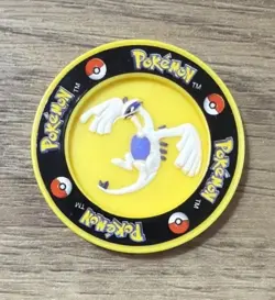 Vintage 2000 Pokemon The Movie Yellow Plastic Legendary Lugia Promo Coin 1.25" - Image 1