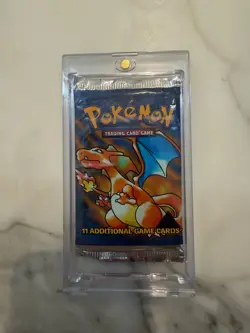 Sealed Unweighed Pokemon Black Triangle Booster Pack Charizard +protective cover - Image 1