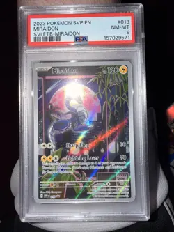 Miraidon Pokemon TCG Black Star Promos SVP013 Holo Card PSA 8 - Image 1