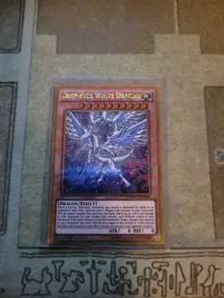 YUGIOH DEEP-EYES WHITE DRAGON MVP1-ENG05 GOLD 1ST ED NM - Image 1