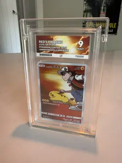 Pokemon Red’s Pikachu 270/SM-P Japanese Promo PSA 9 – 20th Anniversary Campaign - Image 1