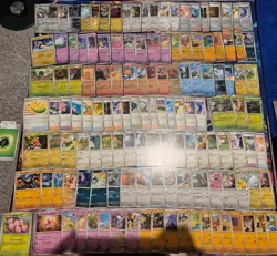 Pokemon TCG Surging Sparks Base Set 52% Complete, 200 cards No Duplicates - Image 1