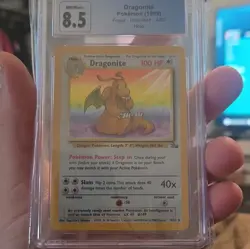 Dragonite Fossil Unlimited Holo 4/62 CGC 8.5 Pokemon TCG Card - Image 1