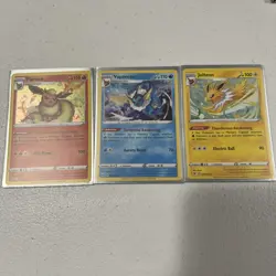 Flareon, Jolteon, and Vaporeon Pokemon TCG Sword and Shield Base Set Cosmo Holo - Image 1