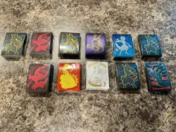 11 Packs Of 65 Count Cards Sleeves , 13 Packs Of Dice, 12 Damage Markers, 11 Vst - Image 1