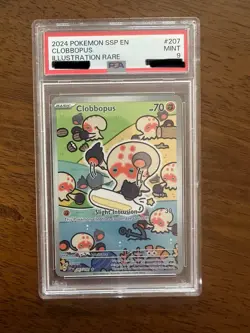 Pokemon TCG Clobbopus Holo Illustration Rare Card Sv08 Surging Sparks 207/191 - Image 1