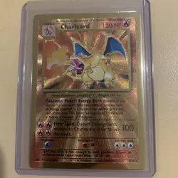 Pokemon Celebrations Gold Metal Charizard Card 4/102 Ultra Premium - Image 1