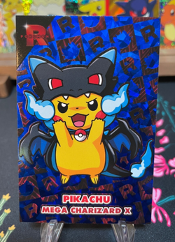 Pikachu Poncho Mega Charizard X Blue Holo Team Rocket Card Database Peru - Image 1