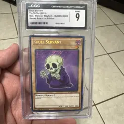 Yugioh Skull Servant (Chibi) (BLMM-EN002) 1st Edition SECRET RARE HOLO (CGC 9) - Image 1