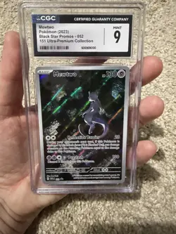 2023 Pokemon 151 UPC Mewtwo Black Star Promo 52 CGC Mint 9 - Image 1