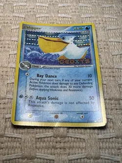 The card is a reverse holo stamped Pelipper 21/107 from EX Deoxys (2005) - Image 2