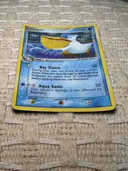 The card is a reverse holo stamped Pelipper 21/107 from EX Deoxys (2005) - Image 3