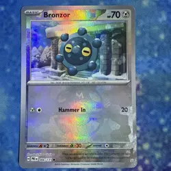 Pokemon TCG Bronzor 066/131 Master Ball Reverse Holo Prismatic Evolutions NM - Image 1