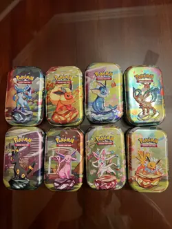 Prismatic Evolutions *EMPTY* Mini Tin Complete Set Of 8 (Tin + Card + Coin) - Image 1