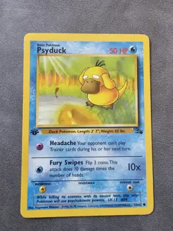 Psyduck NM 53/62 1st Edition Fossil Pokemon TCG Regular MP - Image 1