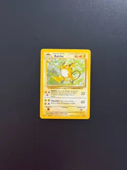 1999 Pokemon TCG Base Set Unlimited Raichu 14/102 Holo Rare WoTC - Image 1