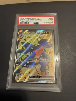 PSA 9 Cynthia’s Garchomp ex 215/182 Ultra Rare Pokemon Card Destined Rivals - Image 1