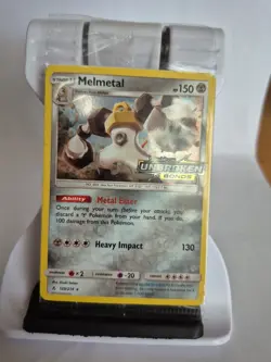 Pokemon TCG Card Melmetal 129/214 Promo Holo Stamped Unbroken Bonds NEW & SEALED - Image 1