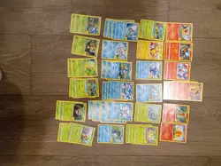 Pokemon Trading Card Game Lot of 25 Anniversary Cards Non Holo X42 Cards - Image 1