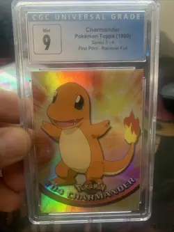 Charmander Pokemon Topps 1999 Card CGC 9 Rainbow Foil Series 1-4 - Image 1