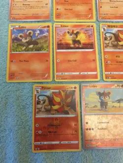 LITLEO & PYROAR BUNDLE OF POKEMON CARDS - Image 4