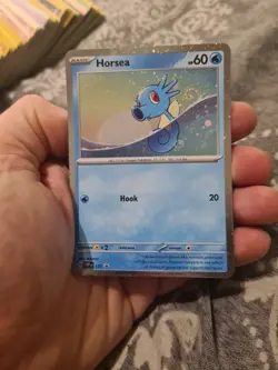 Horsea 137 SVP Pokemon TCG Black Star Promo Card NM Condition With Swirl - Image 1