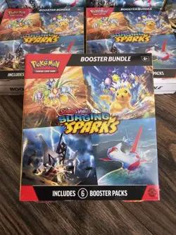 Pokemon Surging Sparks SV08 Booster Bundle TCG 6 packs New Sealed - Image 1