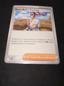 Black Belt's Training 099/131 Sv: Prismatic Evolutions - NM – Pokemon TCG Card - Image 1